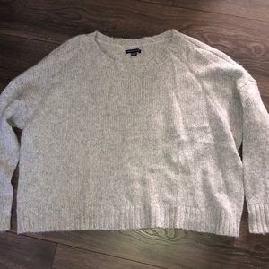 silver/gray sweater